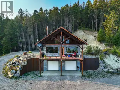 Perched above a sweeping Columbia Valley Wetlands and staring at the rugged Purcell peaks, this cust...