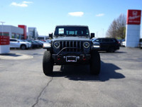 Conquer any terrain with this 2021 Jeep Gladiator Rubicon, boasting a powerful 3.6L Pentastar V6 eng... (image 1)