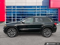 The odometer is 62 093 kilometers below market average! Diamond Black Crystal Pearl 2018 Jeep Grand... (image 1)