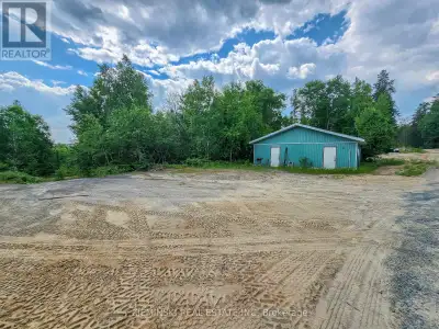 Just under an acre of waterfront fun! This unorganized township lot is ready for your Northern escap...