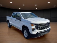 The 2023 Chevrolet Silverado 1500 Crew Cab Short Box 4-Wheel Drive Work Truck, in crisp white with a... (image 3)