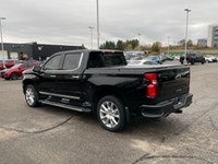The 2023 Chevrolet Silverado 1500 High Country is an impressive black 4x4 truck that combines power... (image 2)