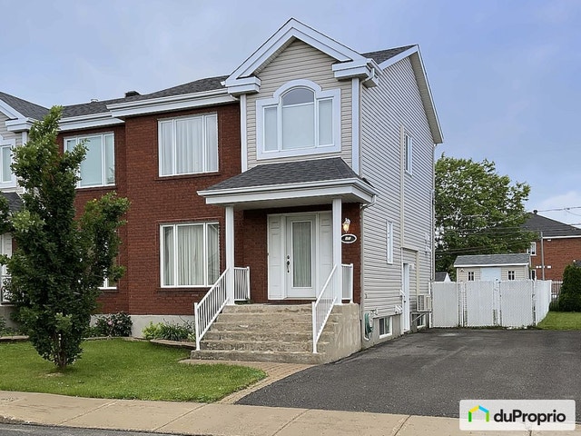 $585,000 - Semi-detached for sale in Varennes — photo 1