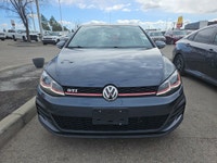 This Volkswagen Golf GTI boasts a Intercooled Turbo Premium Unleaded I-4 2.0 L/121 engine powering t... (image 4)