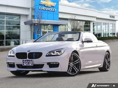 Experience the thrill of open-air driving in this stunning 2018 BMW 6 Series 650i xDrive Convertible...