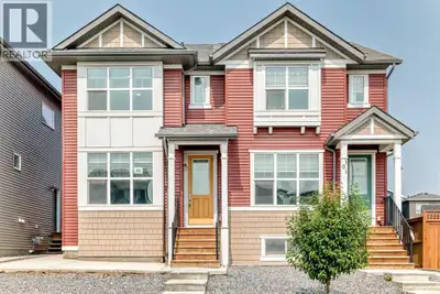 4 BEDS, 3.5 BATHS | LEGAL SUITE | DOUBLE GARAGE | BACK DECK - A legal basement suite makes this semi...