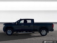 Experience bold luxury and uncompromising capability with the *2021 GMC Sierra Denali*, featuring *8... (image 2)