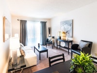 Set on a quiet, leafy street in the mature, family-oriented community of Bayridge, the low-rise apar... (image 1)