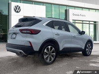 The 2025 Ford Escape Platinum delivers spirited performance through its 2.0L EcoBoost engine with au... (image 4)