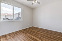 Amenities: In-suite Laundry • Playground • Private Yard Suite & Building: Two-bedroom and three-bedr... (image 5)