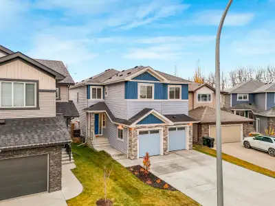 Beautiful 2.400sq.ft home built in 2022 with fully finished basement... air conditioning... towering...