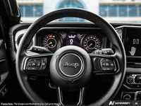 This Jeep Wrangler has a dependable Intercooled Turbo Premium Unleaded I-4 2.0 L/122 engine powering... (image 9)