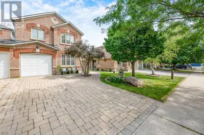 Welcome to this Beautifully Renovated End-Unit Freehold Townhome in Desirable Millcroft! This home c...