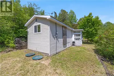 Looking for a lifestyle change? Welcome to this private sanctuary on the river. This 1 bedroom mobil...