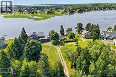 *** WATERFRONT AND NEAR THE CHANNEL // AMAZING VIEWS // SOUTHERN EXPOSURE // INCOME POTENTIAL *** We...