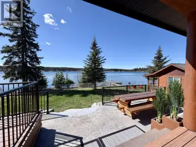 TURN KEY WATERFRONT ESTATE! Beautiful custom home situated on one of the nicest lots on Deka Lake! T...