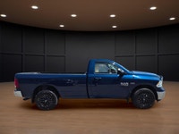 Experience the perfect blend of power and style with the 2020 Ram 1500 Classic SLT 4x4 Reg Cab, dres... (image 4)