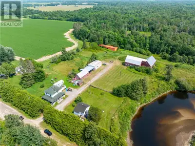Situated along the Vermilion River, this rare 39-acre property combines privacy, versatility, and wa...