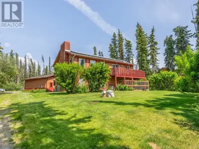 Beautiful Waterfront Home with 100 feet of lakefront, just a short 40-minute drive from Whitehorse....