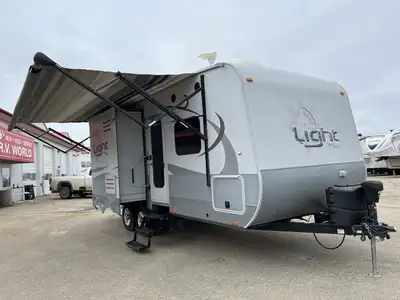 The 2015 Open Range Light 216RBSS offers a smart, spacious layout with dual slide-outs that open up...