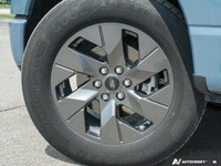 This stunning 2023 Ford F-150 Lightning XLT boasts a powerful dual-motor all-wheel-drive system and... (image 5)