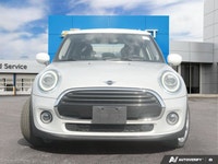 Navigate city streets with playful confidence and undeniable style in this 2021 MINI 5 Door Cooper H... (image 1)