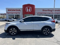 Seamlessly blending sophisticated comfort with dynamic performance, this 2019 Honda CR-V Touring in... (image 9)