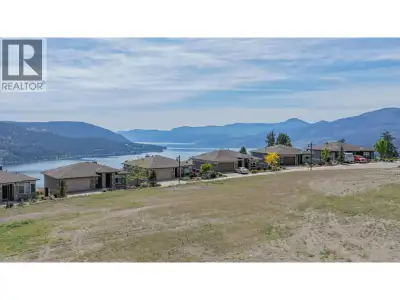 Perched above the sparkling waters of Okanagan Lake, Lot 7 offers a rare opportunity to build a thou...