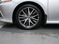 See Dealer Website for Details. 2022 Toyota Camry HYBRID XLE Engine: 4 Cylinder Engine 2.5L L/100Km... (image 3)