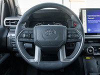 Introducing the 2024 Toyota Tacoma 4x4 Double Cab Auto SB, a white powerhouse designed for those who... (image 9)