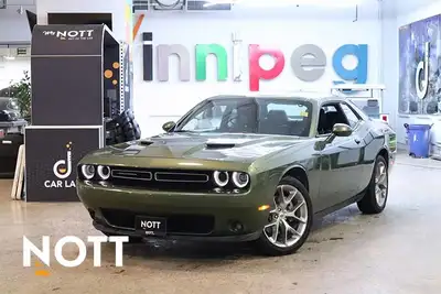 The 2023 Dodge Challenger SXT combines classic American muscle styling with modern comfort and techn...