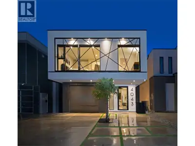 This stunning 4-bedroom, 3.5-bath lakefront Net Zero home blends sustainable design with timeless hi...