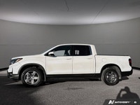 This Honda Ridgeline boasts a Regular Unleaded V-6 3.5 L/212 engine powering this Automatic transmis... (image 1)