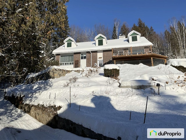$569,000 - Bungalow for sale in Val-Morin — photo 1