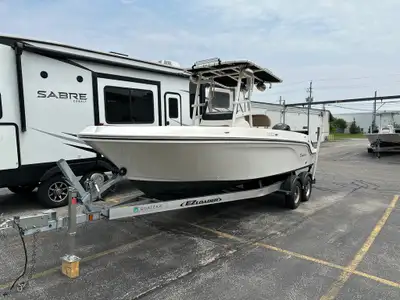 For Sale: 2021 Trophy T22CC with Brand New 2024 Aluminum EZ Loader Trailer Price: $63,495 + tax Only...