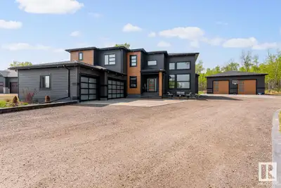 Country Luxury awaits in this custom built 2 storey home complete with a custom shop nestled in the...