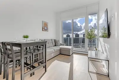 Feel at home in this modern 1-bedroom, 1-bathroom condo in Surrey Central, offering breathtaking 30t...