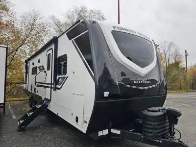 EAST TO WEST Alta travel trailer 3150KBH highlights: Double Slides King Bed Walk-In Pantry 12V Black...