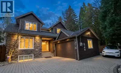 Experience pure North Shore beauty in this stunning residence where mountain charm meets modern vers...