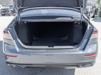 The 2024 Honda Accord Hybrid Touring commands attention in a refined Grey finish that highlights its... (image 6)