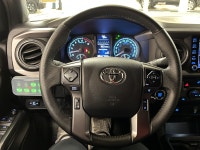 Built to outwork expectations and outplay the weekend, this 2021 Toyota Tacoma in Cement proves capa... (image 6)