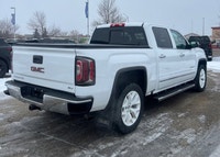 Welcome to Capital GMC! Looking for more luxury in the All New GMC Sierra? This 4WD White Sierra SLT... (image 4)