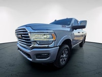 Introducing the powerful 2023 Ram 3500 Limited Longhorn in a eye-catching silver color, boasting a 4... (image 6)