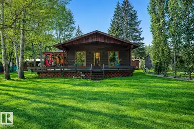 For those who want a large lot, treed large acreage feel--without the hassle of large acreage upkeep...