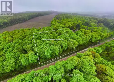 Welcome to this exceptional two-acre building lot, tucked away on a quiet dead-end road in the heart...