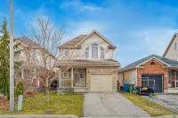 FOR SALE: 42 ATTO DRIVE Drive: Your Ideal Guelph Haven!