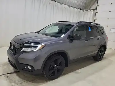 Our 2020 Honda Passport Touring in Modern Steel Metallic is an incoming vehicle! Call to find out mo...