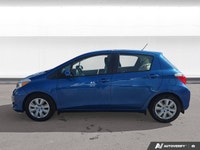 Experience efficient and reliable driving with this 2013 Toyota Yaris. Finished in eye-catching Blaz... (image 1)