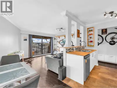 Welcome to The Cambridge. This top-floor, spacious corner unit offers 2 bedrooms and 1 bathroom, com...
