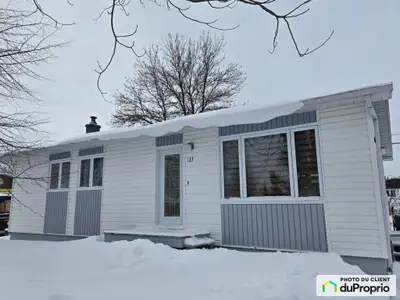 Charmant bungalow unifamilial situé dans un quartier tranquille, à distance de marche du transport e...